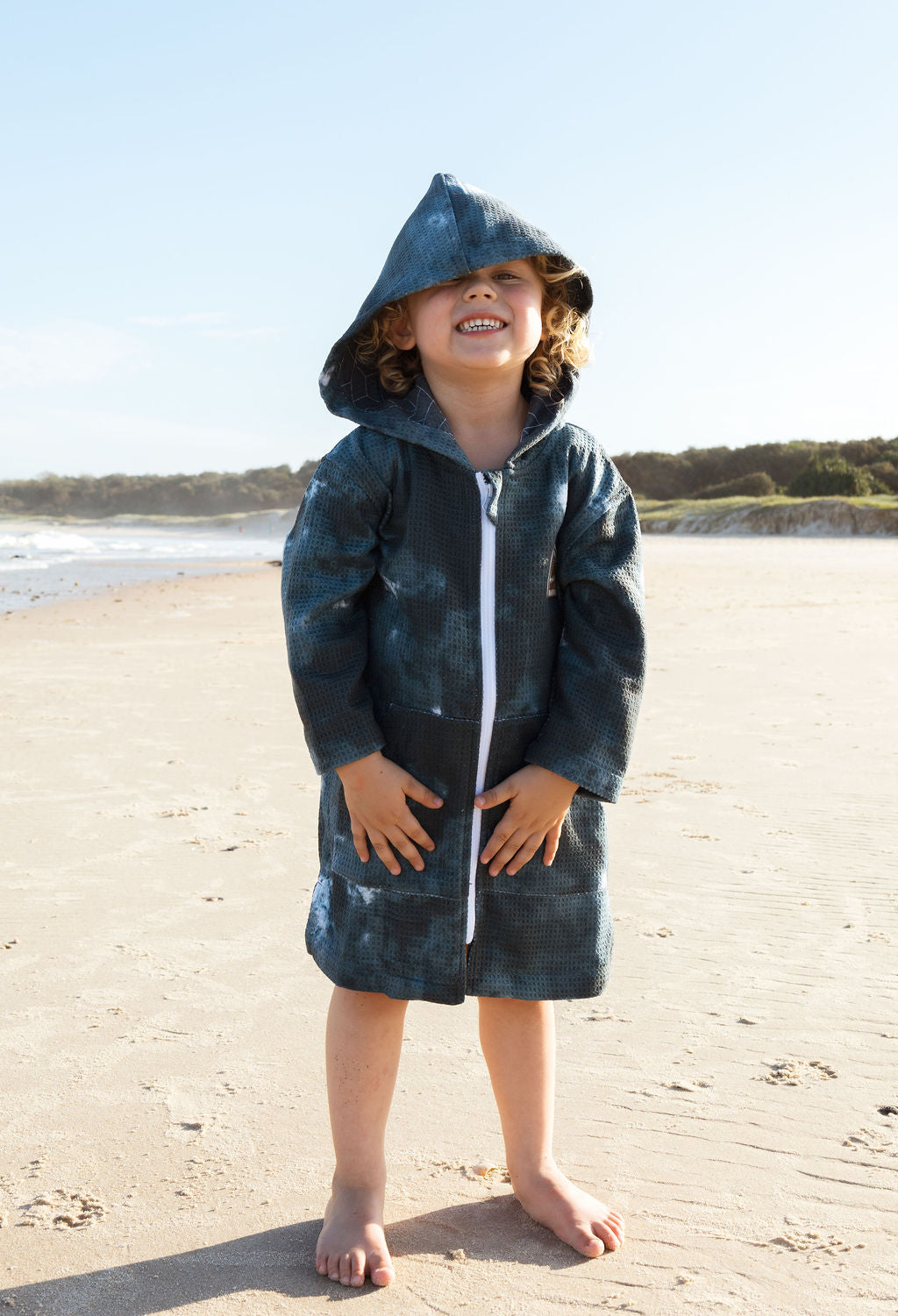 Thunderstorm wearable towel for kids – zipped and sand-free
