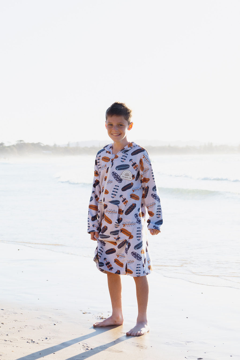 Surfing Safari kids towel – hooded beachwear in earthy tones