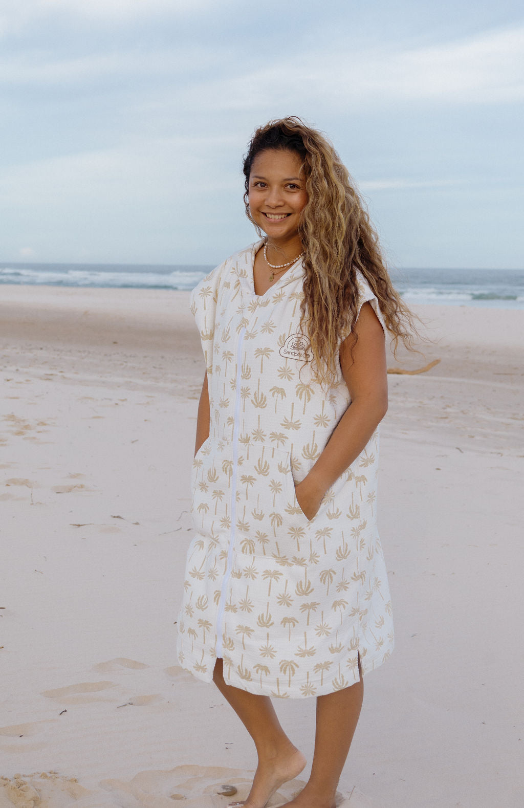 woman wearing microfibe beach towel